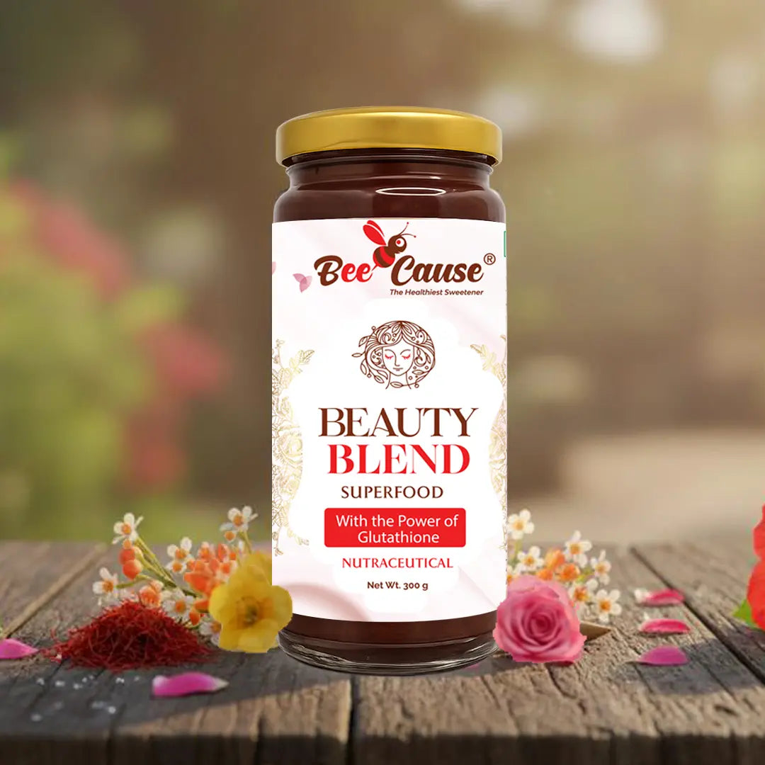 Bee Cause Beauty Blend superfood jar on a wooden surface with flowers in the background