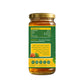 Jar of honey with a green label on a white background