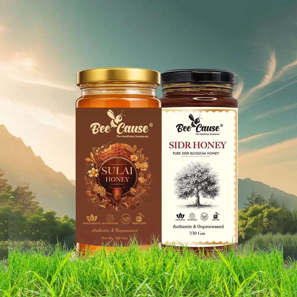 Two jars of Bee Cause brand honey placed in a grassy field with a mountain background at sunset. The left jar is Sulai Honey, and the right jar is Pure Sidr Blossom Honey.