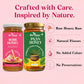 Two jars of Bee Cause honey on a pink background: a pink-labeled Rose Honey jar on the left and a green-labeled Paan Honey jar on the right, with marketing text and icons reading Raw Honey Base, Natural Flavors, No Added Colors, and No Preservatives.