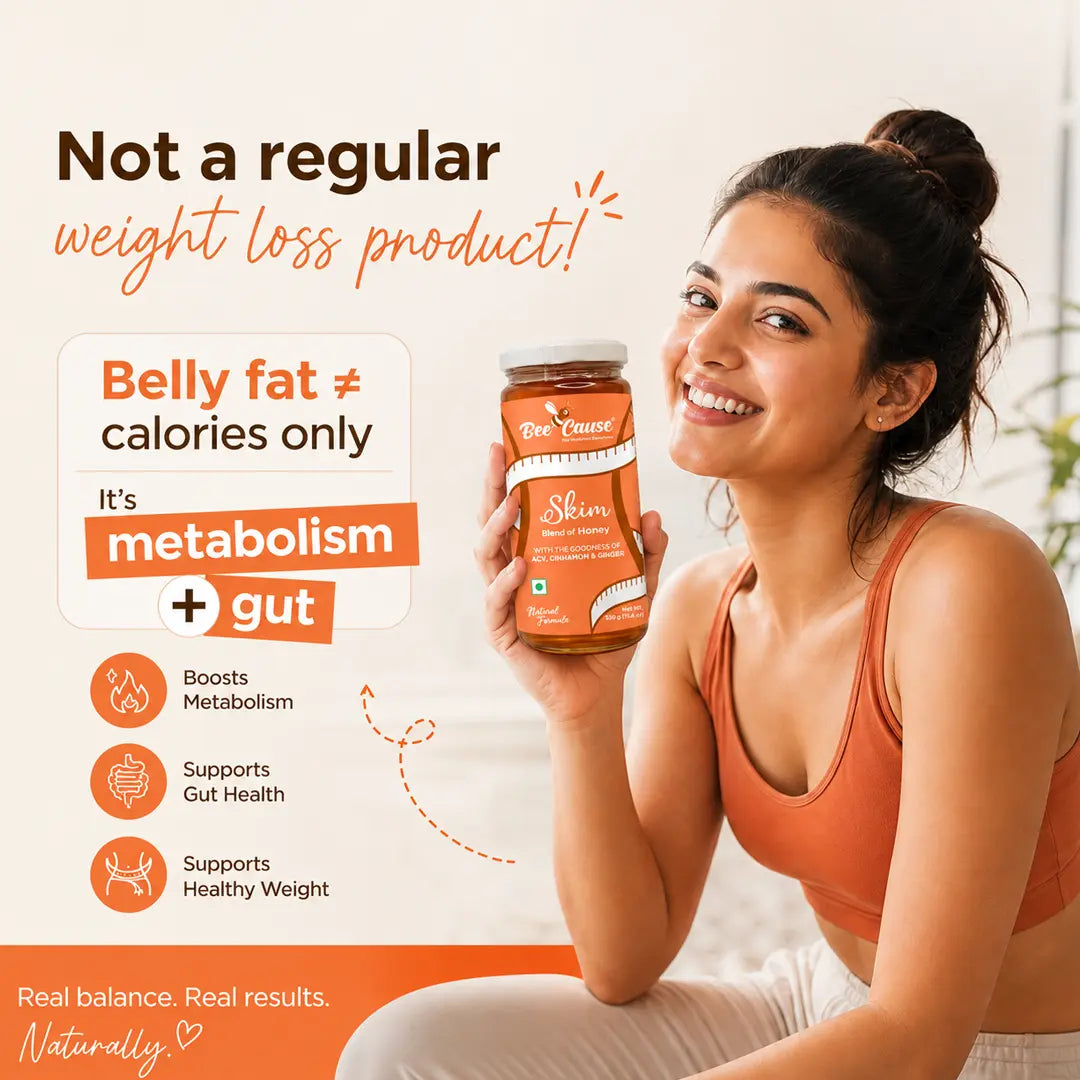 A woman in an orange sports bra holds a jar of Dr. Vaidya's Skimmed Milk powder.
