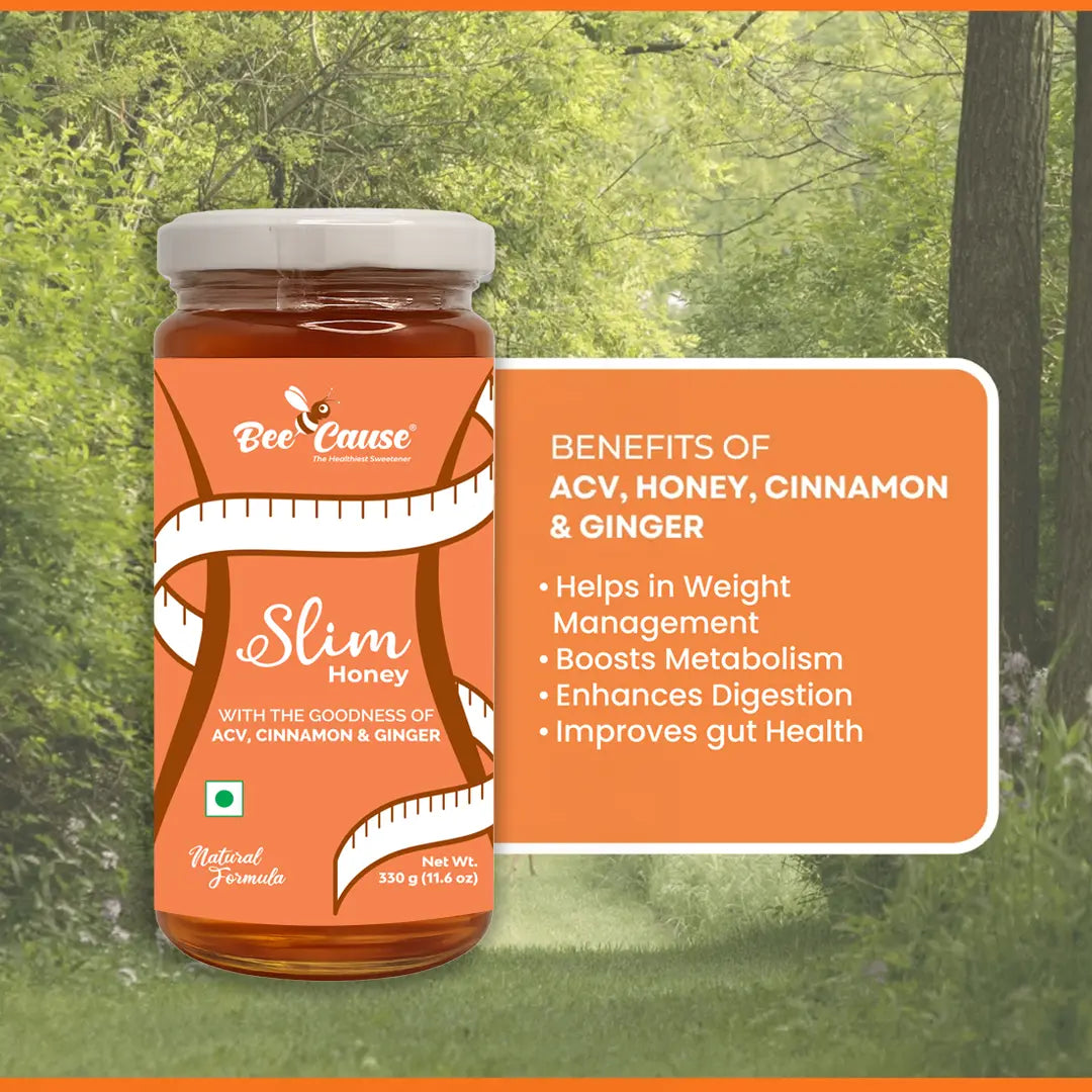 A jar of Bee Cause Slim Honey shown against a serene forest background. Next to it is an orange text box listing the benefits of ACV, Honey, Cinnamon, and Ginger: helps in weight management, boosts metabolism, enhances digestion, and improves gut health.