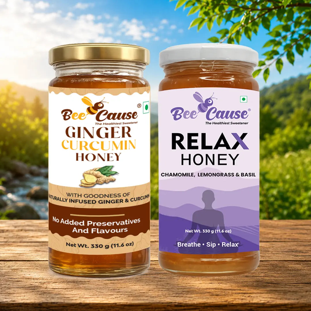 Two jars of honey from Bee Cause with a scenic background