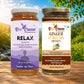 Two jars of Bee Cause herbal honey displayed side-by-side on a wooden surface with a blurred outdoor background. The left jar is 'RELAX' blend of chamomile, lemongrass, basil & honey, with a purple label.