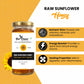 A jar of Bee Cause Raw Sunflower Honey displayed on a split yellow and white background with promotional text highlighting its nutritional and healing properties.