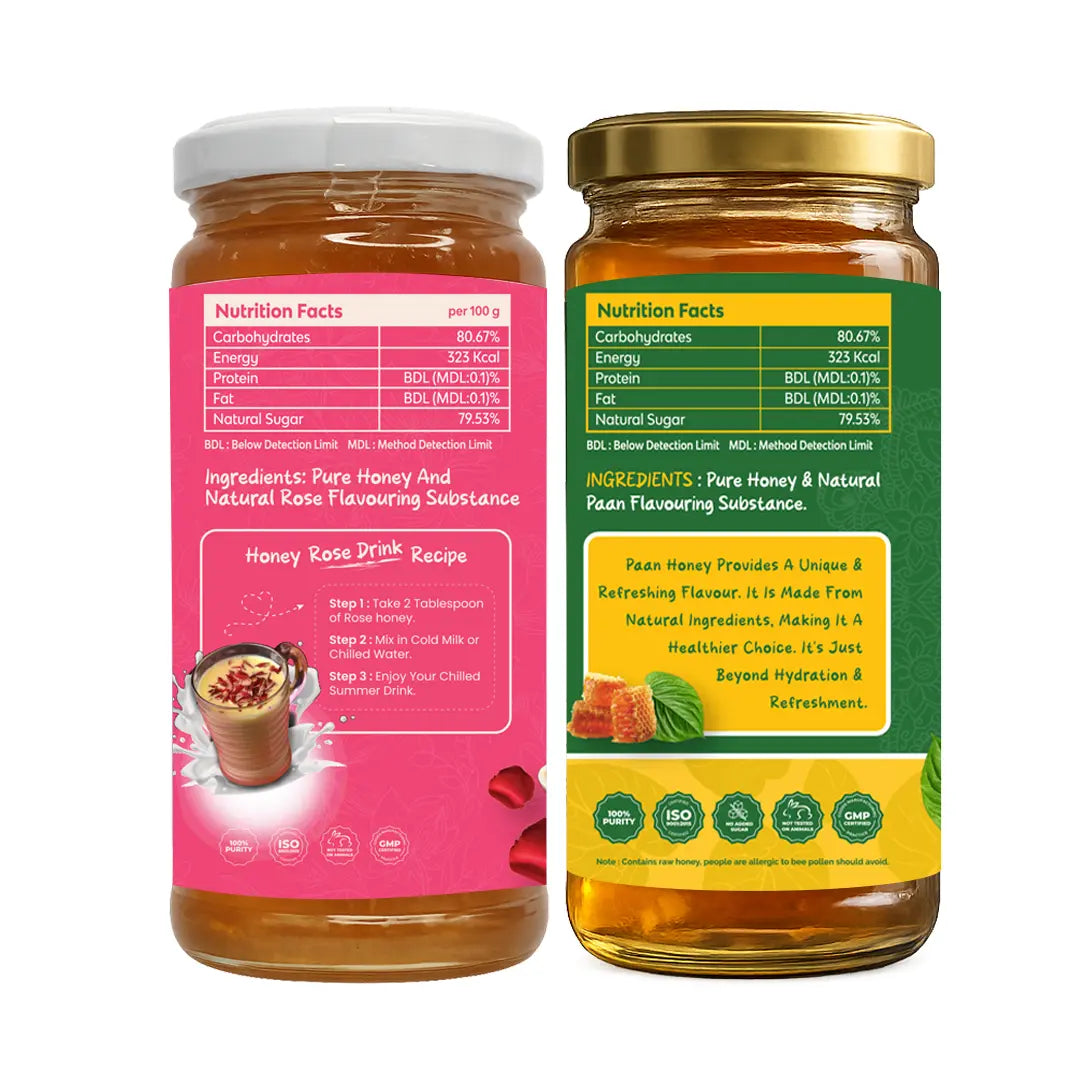 Two glass jars of honey shown side by side on a plain white background, displaying the front and back packaging of a Honey Rose Pink Recipe. The left jar has a white lid and a pink label, while the right jar has a gold lid and a green and yellow label with nutrition facts.