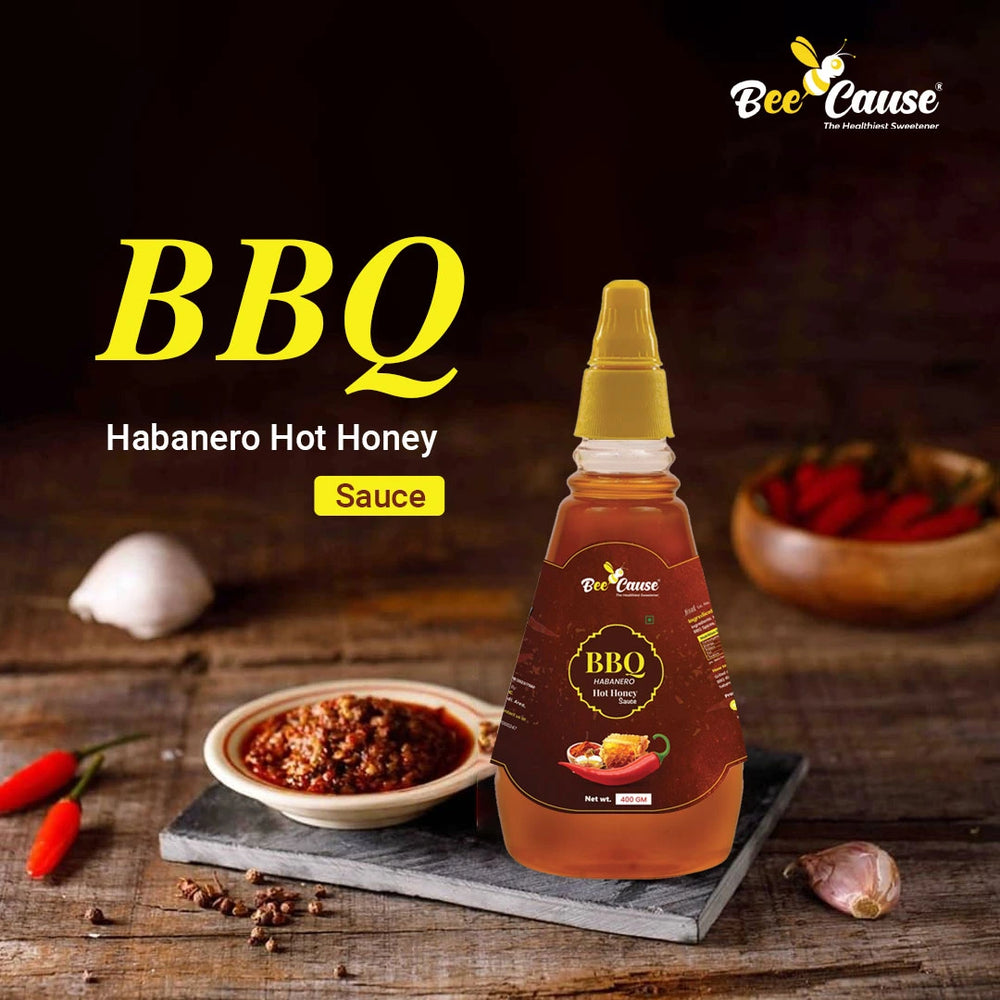 BBQ Habanero Hot Honey Sauce bottle next to a bowl of smoky relish, emphasizing the spicy BBQ flavor.