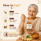 Woman using a jar of 'Bee Care' Ginger & Turmeric Honey with usage instructions on a beige background.