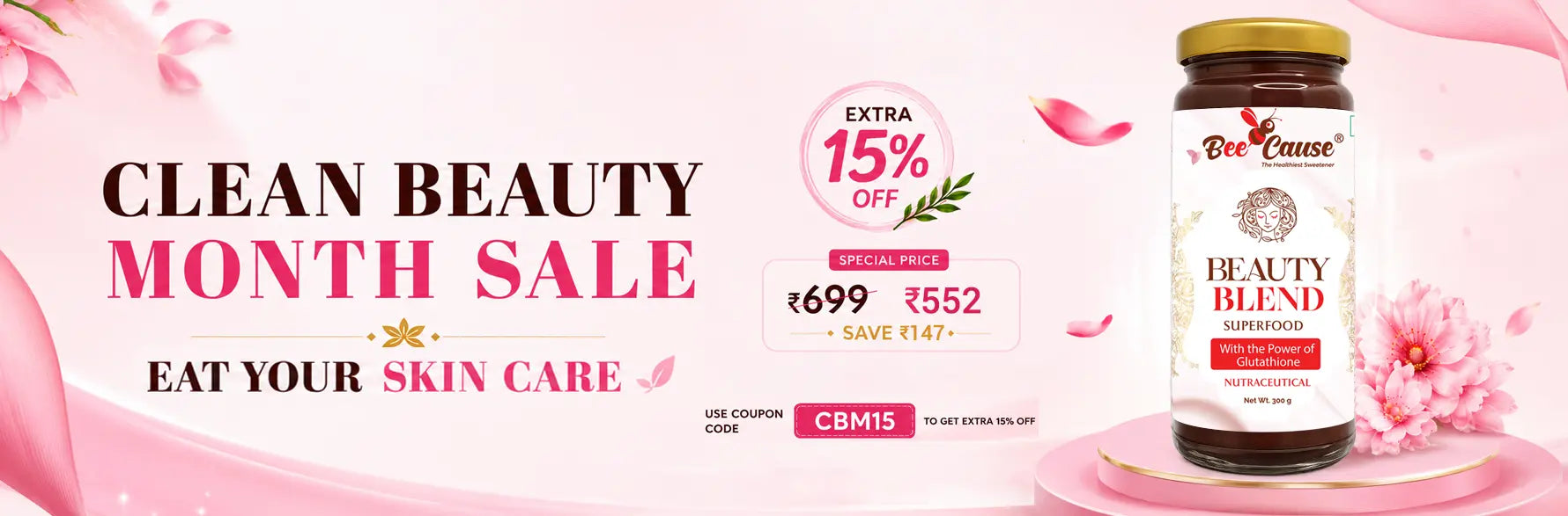 Bee Cause Beauty Blend Superfood honey jar on a pink promotional banner for Clean Beauty Month Sale. The banner features the text "Eat Your Skin Care," a special price of ₹552 (saving ₹147), an extra 15% off circle, and the coupon code CBM15.
