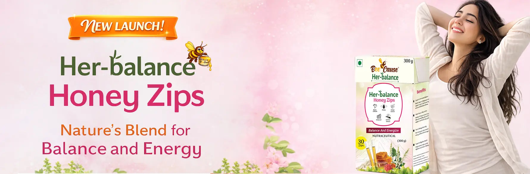 A wide web banner announcing the "New Launch!" of Bee Cause Her-balance Honey Zips. A relaxed, smiling woman stretches next to the product box, with text reading "Nature's Blend for Balance and Energy" against a soft pink floral background.