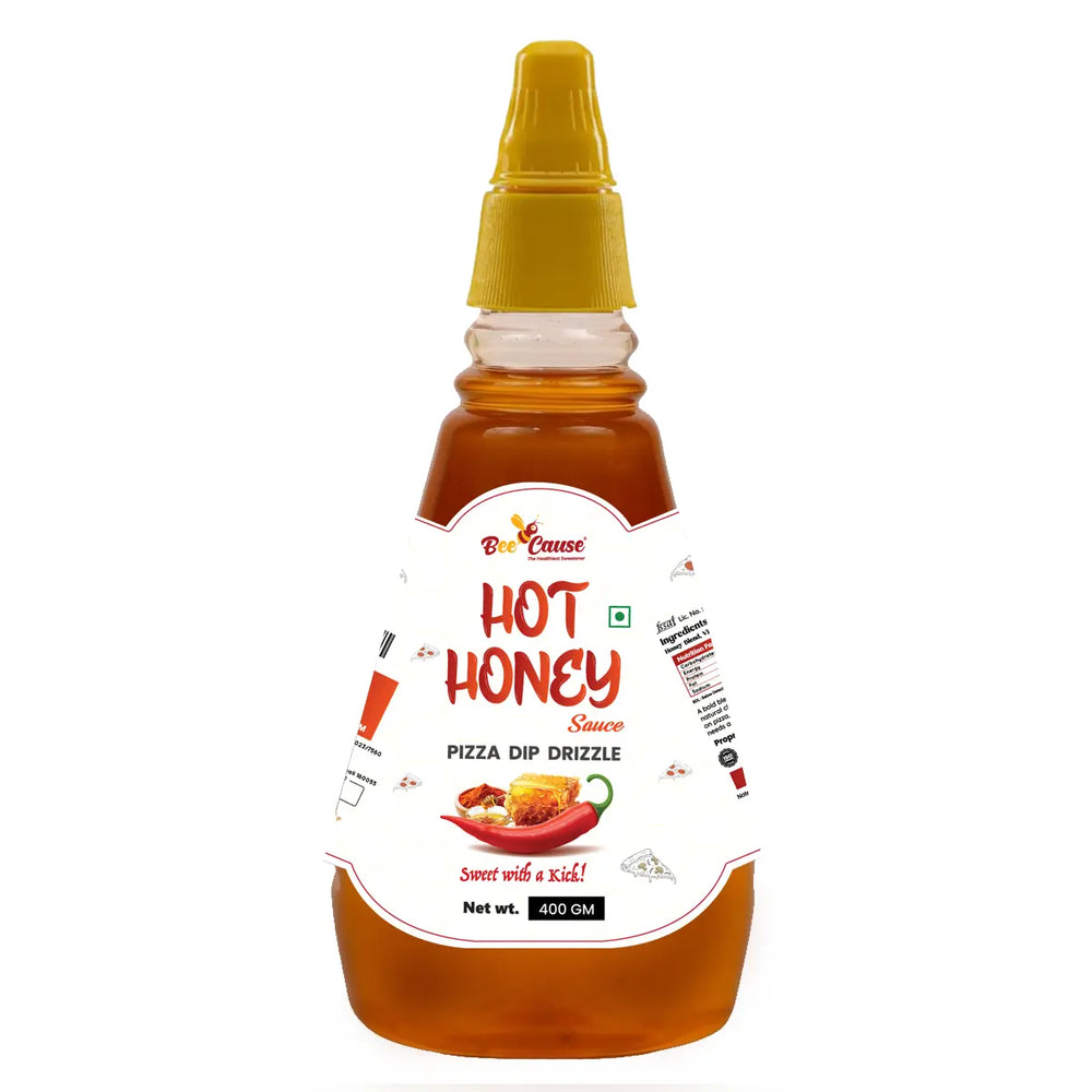 Bottle of Bee Cause Hot Honey Sauce, a sweet and spicy pizza dip drizzle.