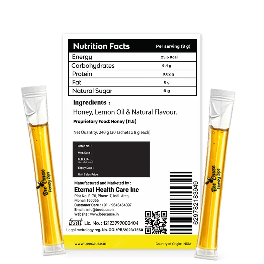 Product label and nutritional information for Bee Cause Lemon Honey Zips. Displays nutrition facts per 8g serving, ingredients including Honey, Lemon Oil, and Natural Flavour, manufacturer details for Eternal Health Care Inc, an FSSAI license number, and a barcode. The label is positioned between two honey sachets.