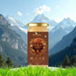 A scenic product display of Bee Cause Sulai Honey set against a majestic mountain backdrop, emphasizing its pure origin from high-altitude regions.