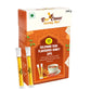 A 240g box of Bee Cause Sulemani Chai Flavoured Honey Zips containing 30 sachets, with two individual honey sticks leaning against the front of the bright orange packaging.