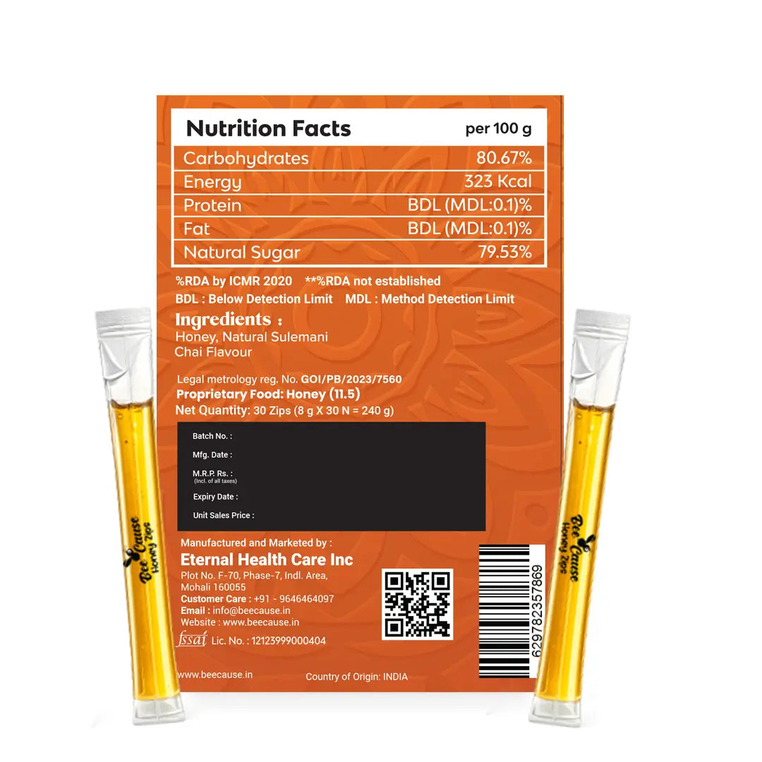Back panel of the Bee Cause Sulemani Chai Flavoured Honey Zips packaging, displaying the Nutrition Facts, ingredients, FSSAI license number, and manufacturing details for Eternal Health Care Inc., flanked by two single-serve honey sachets.