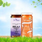 A fresh nature-themed product display of the Bee Cause Wellness Combo featuring Relax Honey, infused with chamomile and lemongrass for stress relief, alongside Slim Honey, containing ACV and cinnamon for weight management.