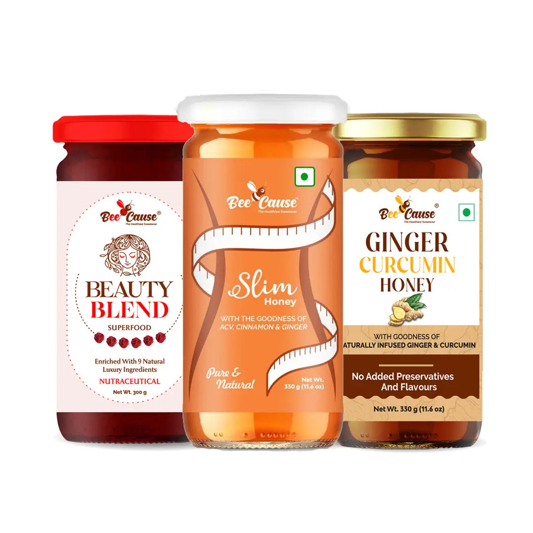 BeeCause Beauty Blend Superfood, Slim Honey with ACV cinnamon and ginger, and Ginger Curcumin Honey jars displayed together, made with natural ingredients and no added preservatives.