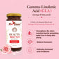 Bee Cause Beauty Blend supplement jar with GLA information on a pink background