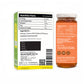 Jar of honey with nutritional label and packaging on a white background