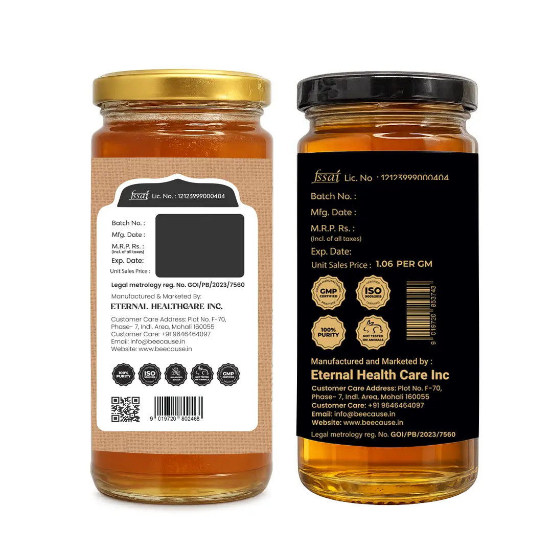 Two glass jars of honey shown side by side on a white background, displaying both the front label and the back label. The left jar has a gold lid and shows the back label, while the right jar has a black lid and shows the front label with product details and certification logos.