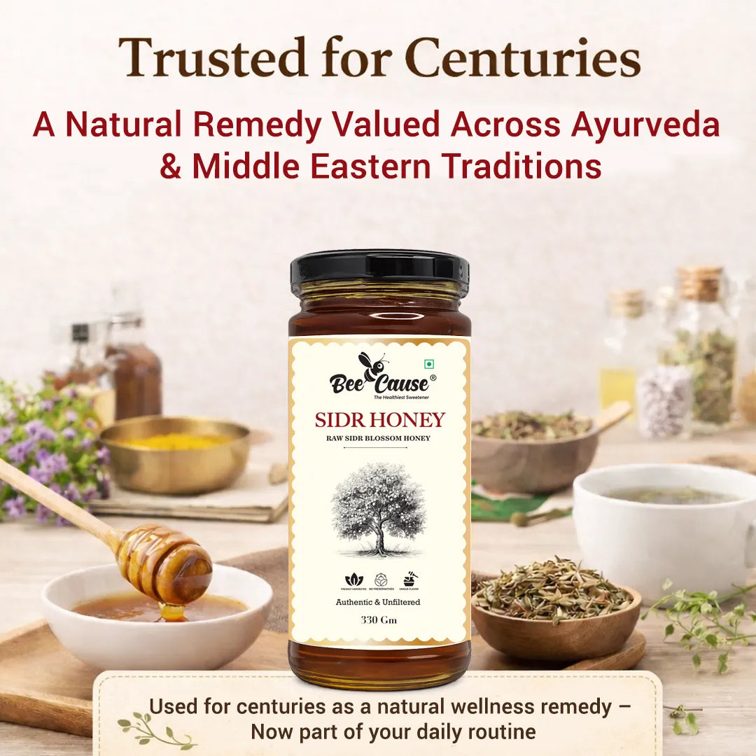 A jar of Bee Cause Sidr Honey centered on a styled tabletop scene with bowls, a honey dipper, dried herbs, and decorative text reading 'Trusted for Centuries' and 'A Natural Remedy Valued Across Ayurveda & Middle Eastern Traditions.'.