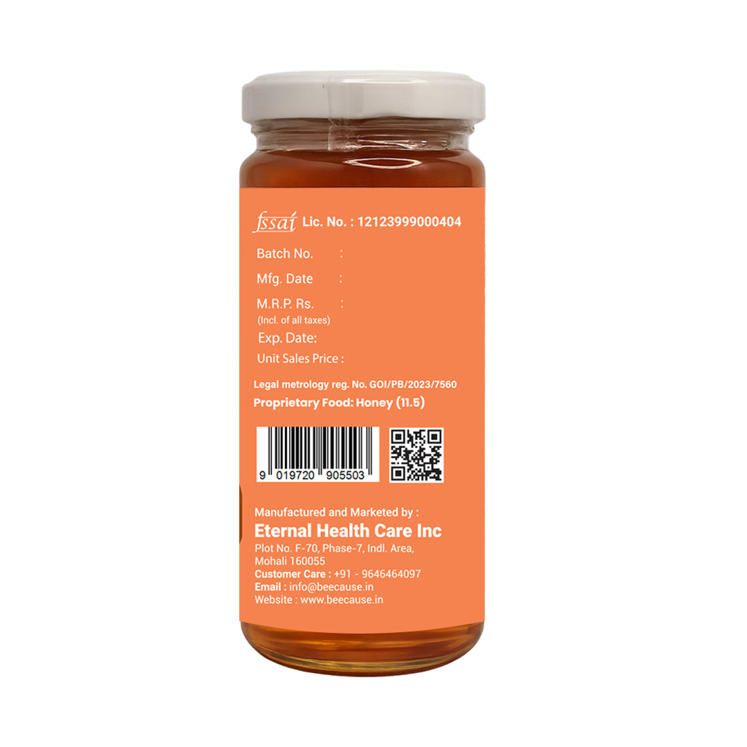 Jar of honey with an orange label on a white background