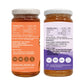 Two amber glass supplement bottles with white caps shown side by side on a white background, displaying the front and back labels of a raw honey lemon grass oil product.